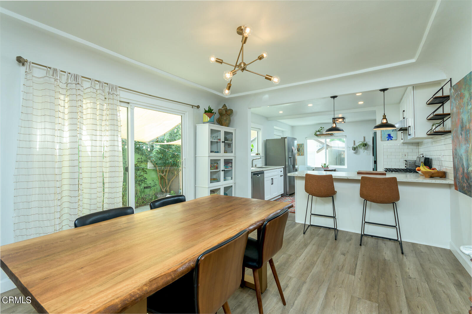 6540 Northside Drive Los Angeles, CA 90022 - Photo 12 of 54 a view of a dining room with furniture window and outside view