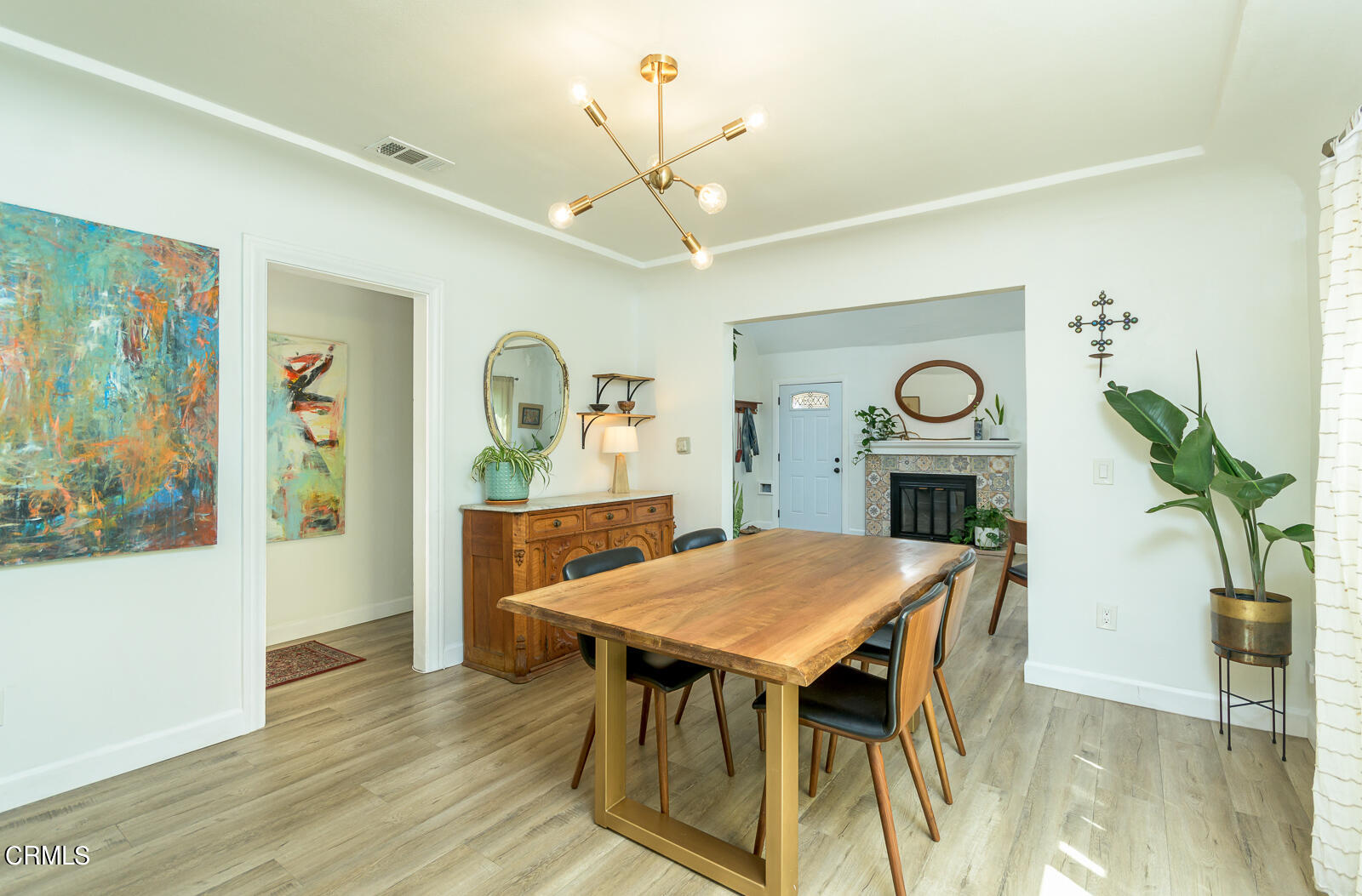 6540 Northside Drive Los Angeles, CA 90022 - Photo 14 of 54 a view of a dining room with furniture and wooden floor