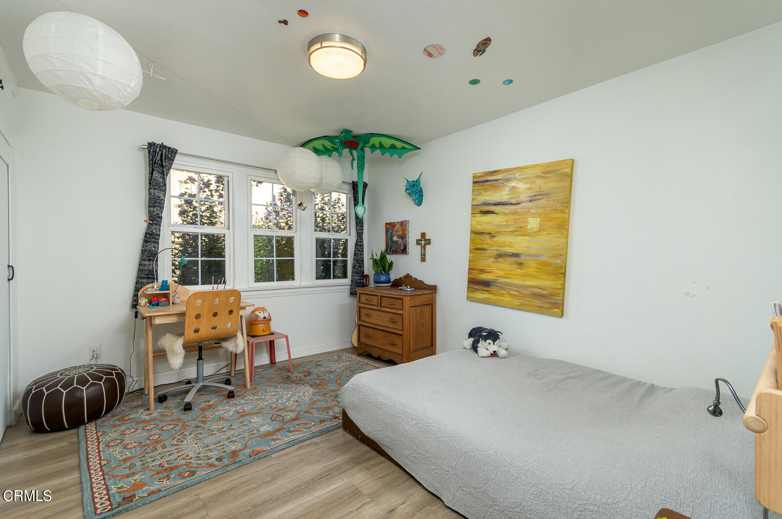 6540 Northside Drive Los Angeles, CA 90022 - Photo 25 of 54 a bed room with a bed and a chair