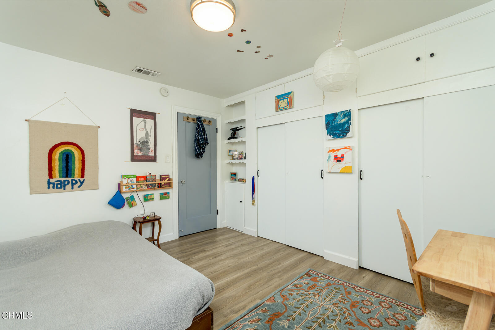 6540 Northside Drive Los Angeles, CA 90022 - Photo 26 of 54 a bedroom with a bed and a window