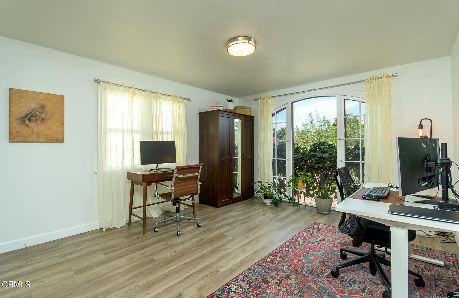 6540 Northside Drive Los Angeles, CA 90022 - Photo 28 of 54 a view of a workspace with furniture and a window