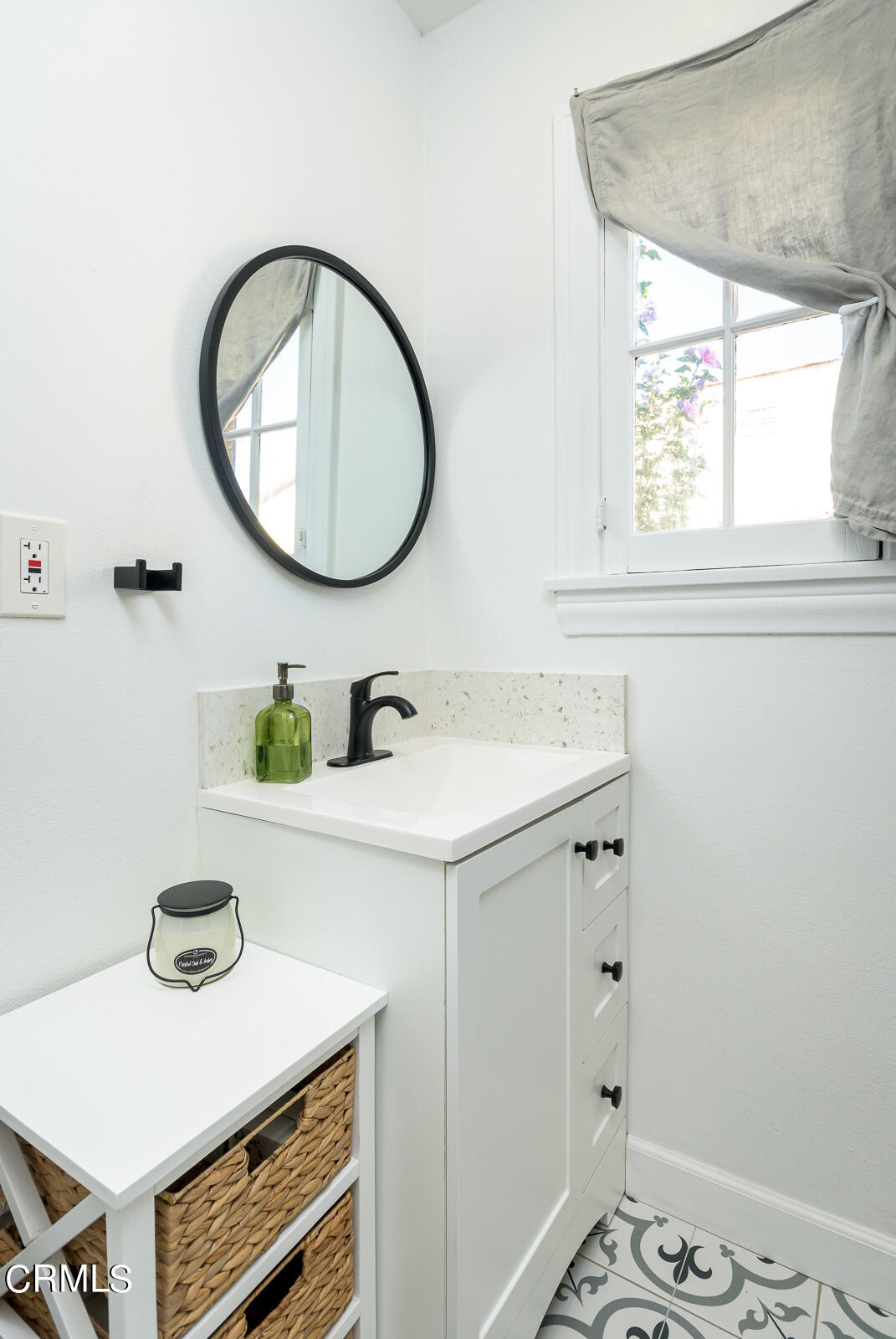 6540 Northside Drive Los Angeles, CA 90022 - Photo 33 of 54 a bathroom with a sink and a mirror