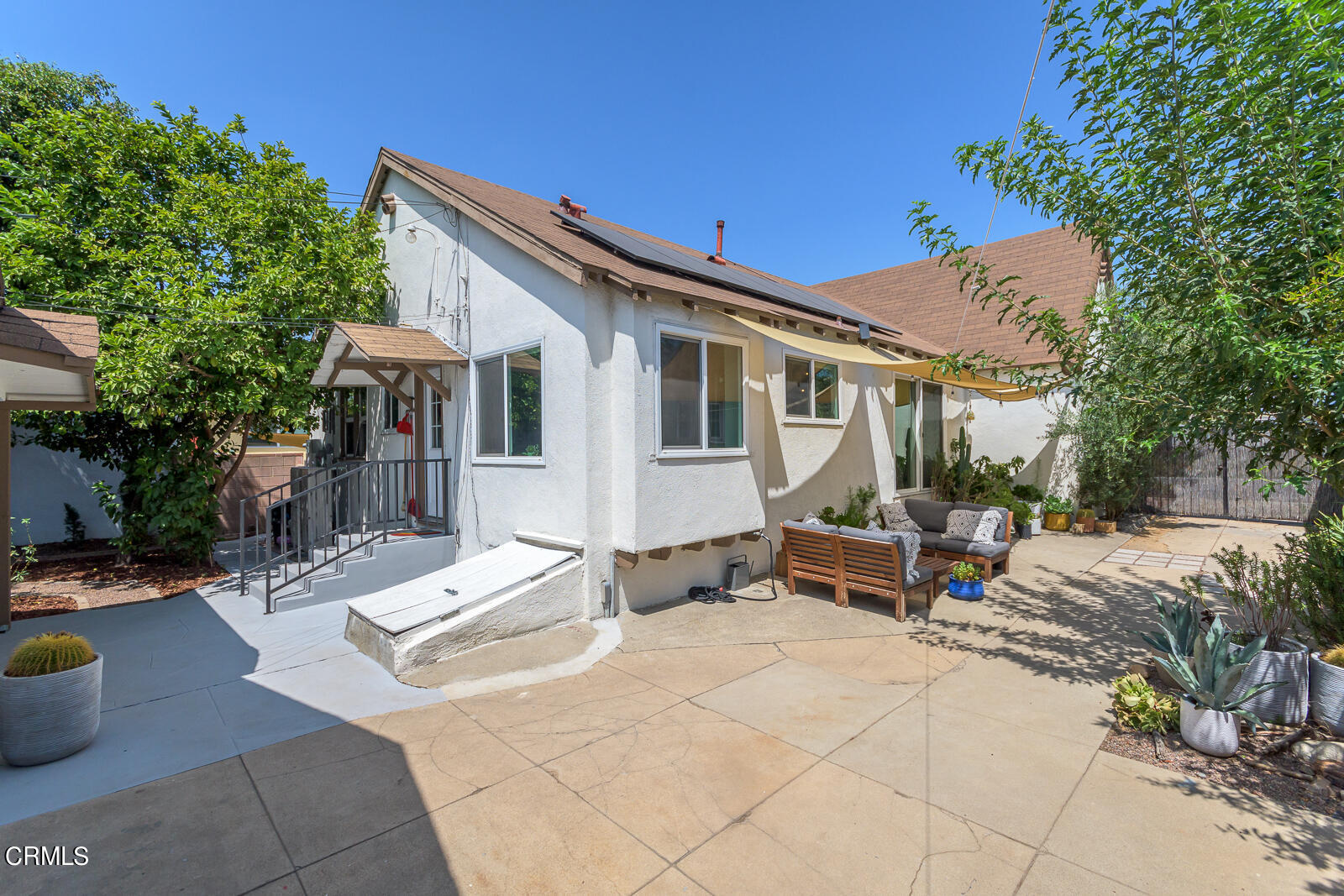 6540 Northside Drive Los Angeles, CA 90022 - Photo 37 of 54 a view of a patio with couches and potted plants