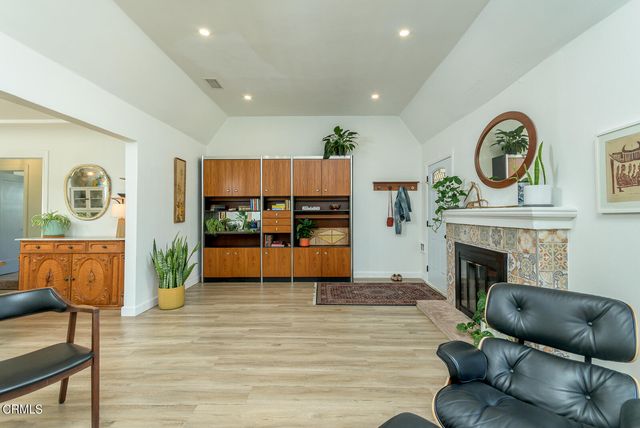 a kitchen with a table and chairs in it