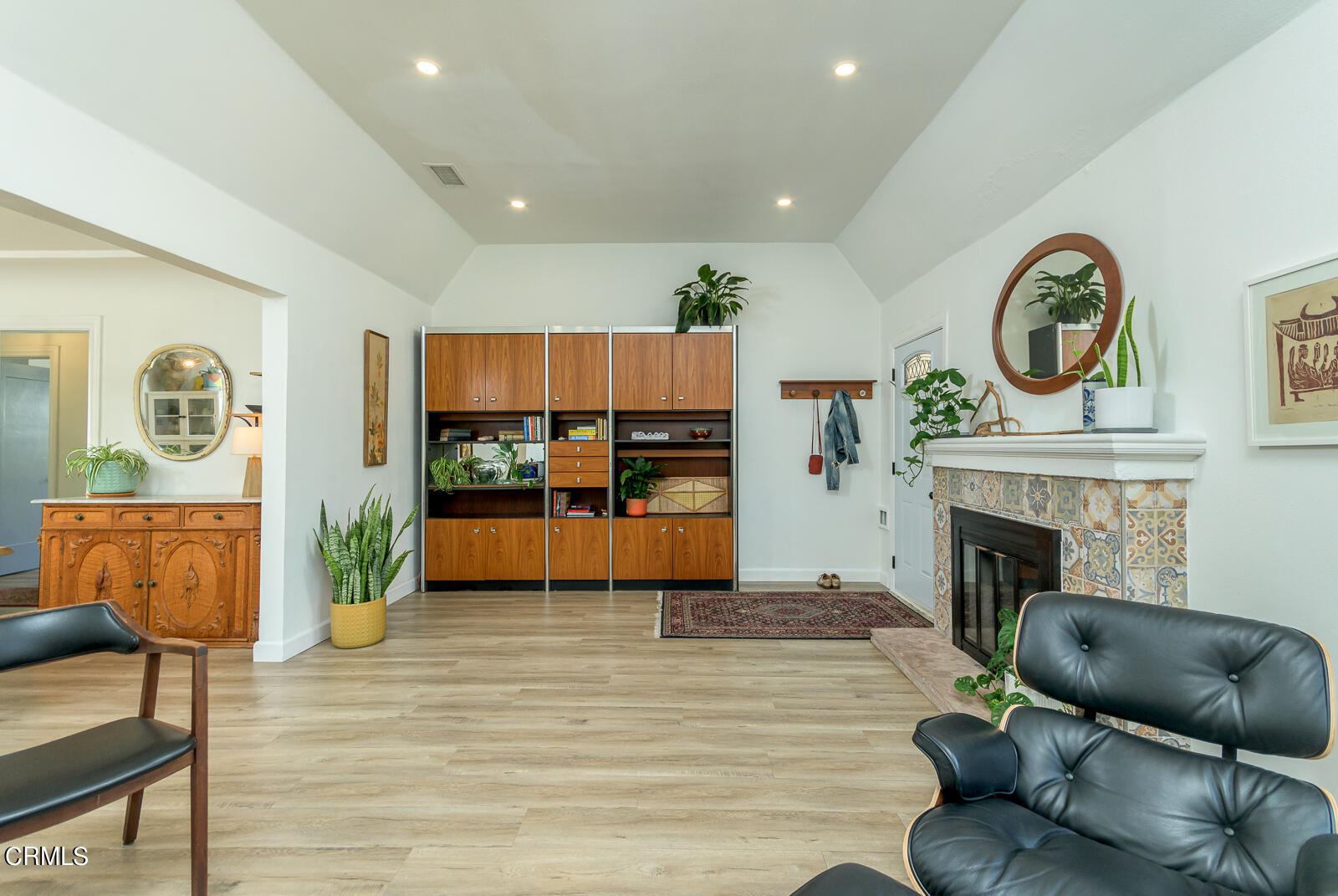 6540 Northside Drive Los Angeles, CA 90022 - Photo 9 of 54 a living room with furniture and a fireplace