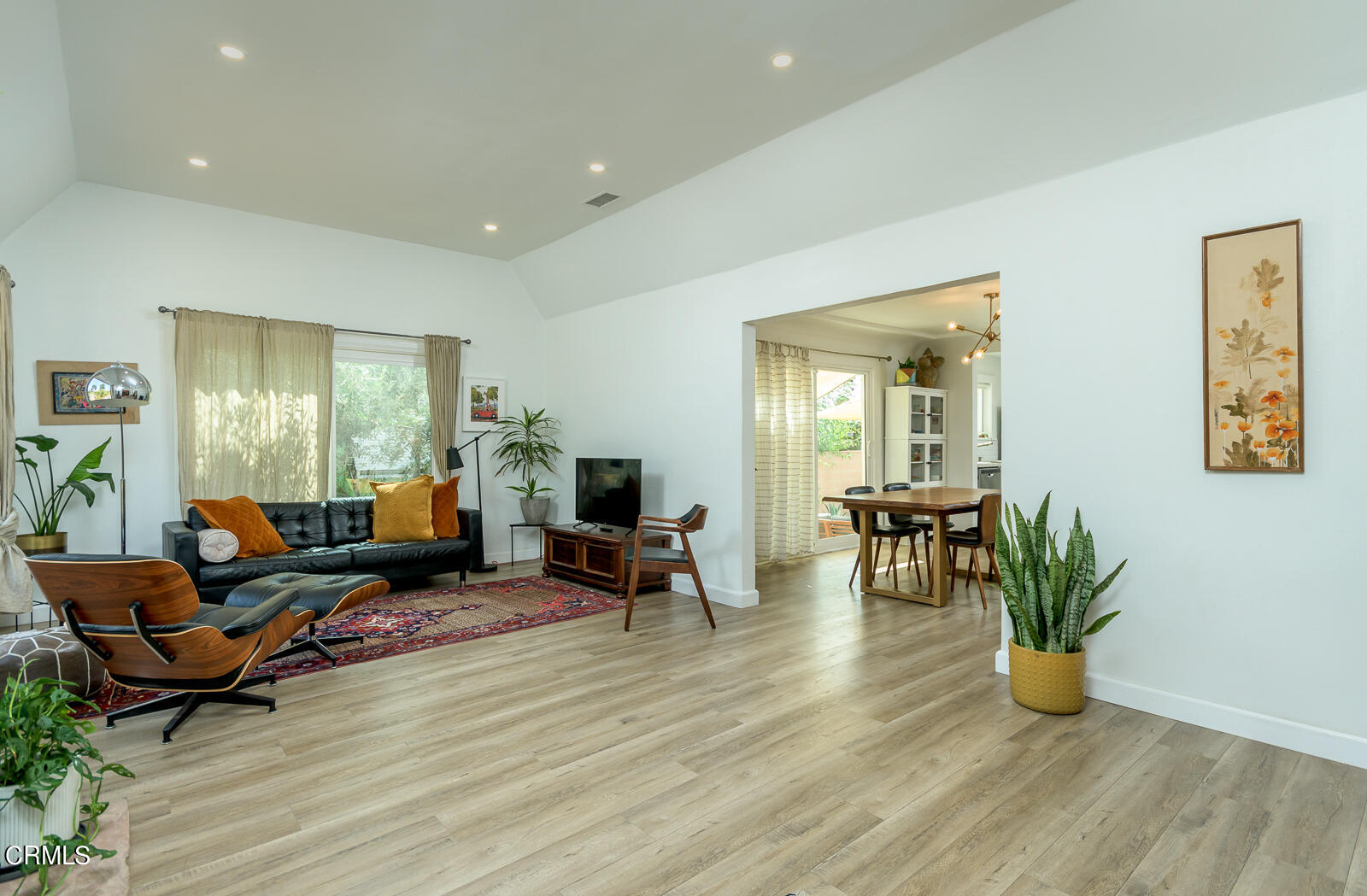 6540 Northside Drive Los Angeles, CA 90022 - Photo 10 of 54 a living room with furniture and a potted plant