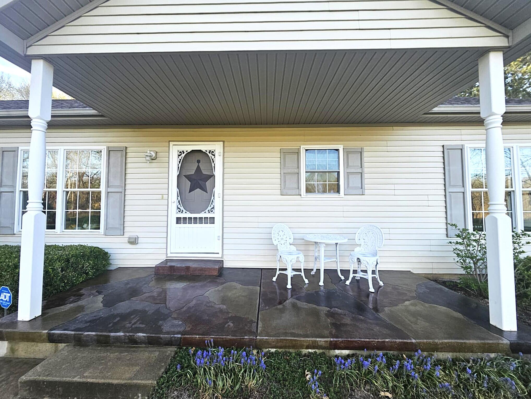 9290 Reynolds Road Bellevue, MI 49021 - Photo 10 of 37 front porch