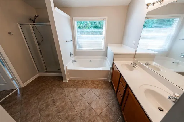 a view of a livingroom with a ceiling fan and window