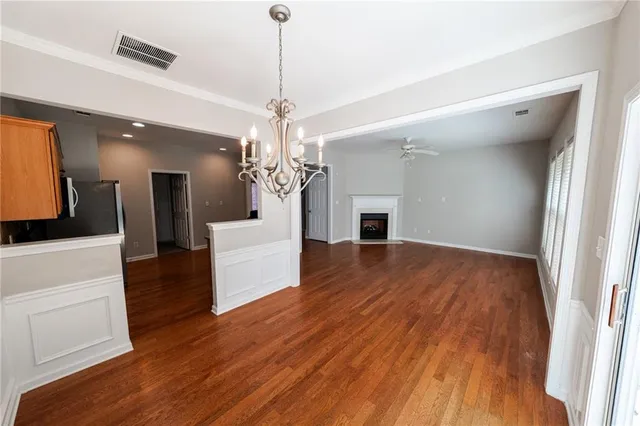 a view of a kitchen and a sink wooden floor fire place