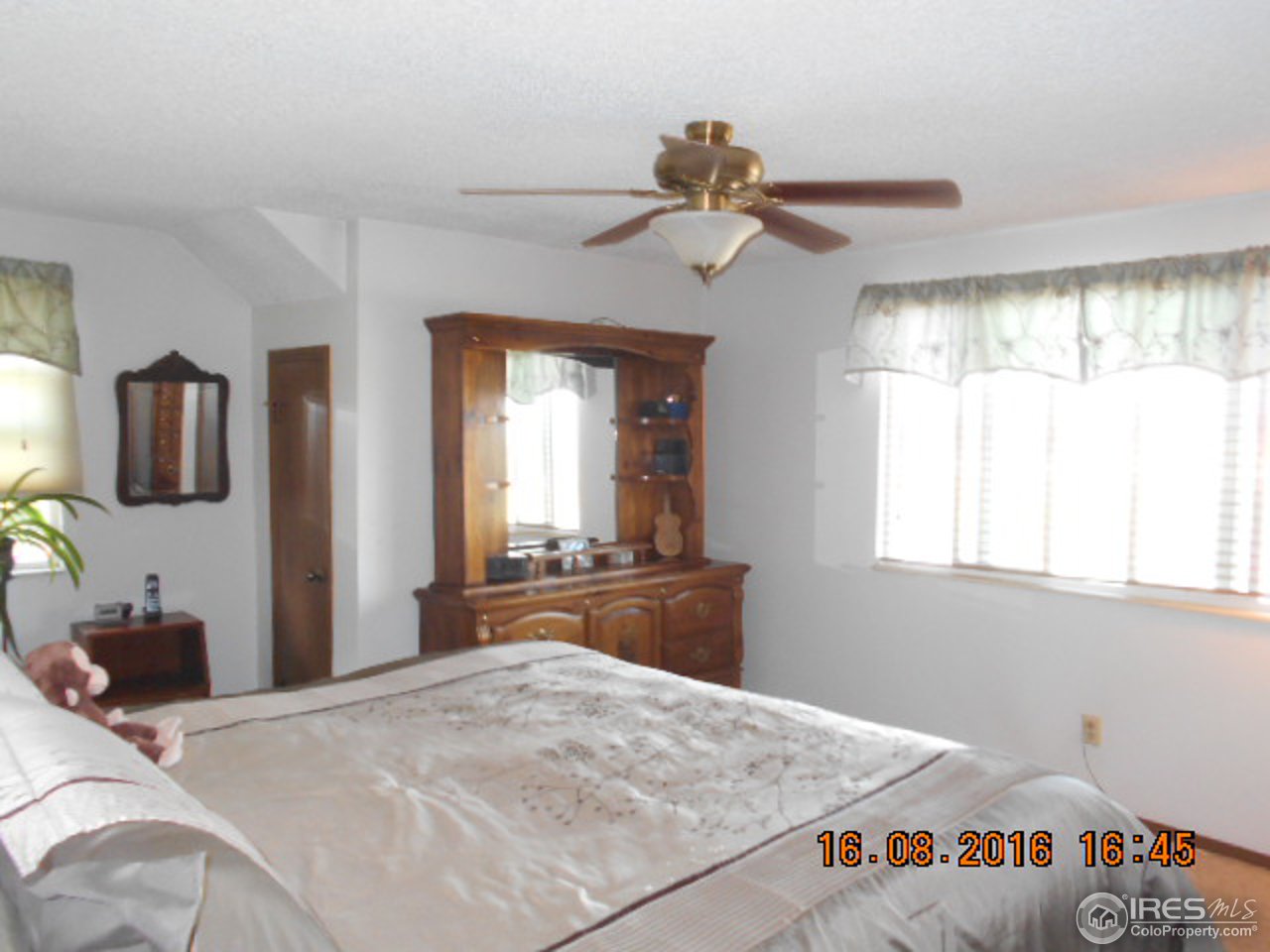 36151 Appy Road Eaton, CO 80615 - Photo 17 of 34 Master bedroom