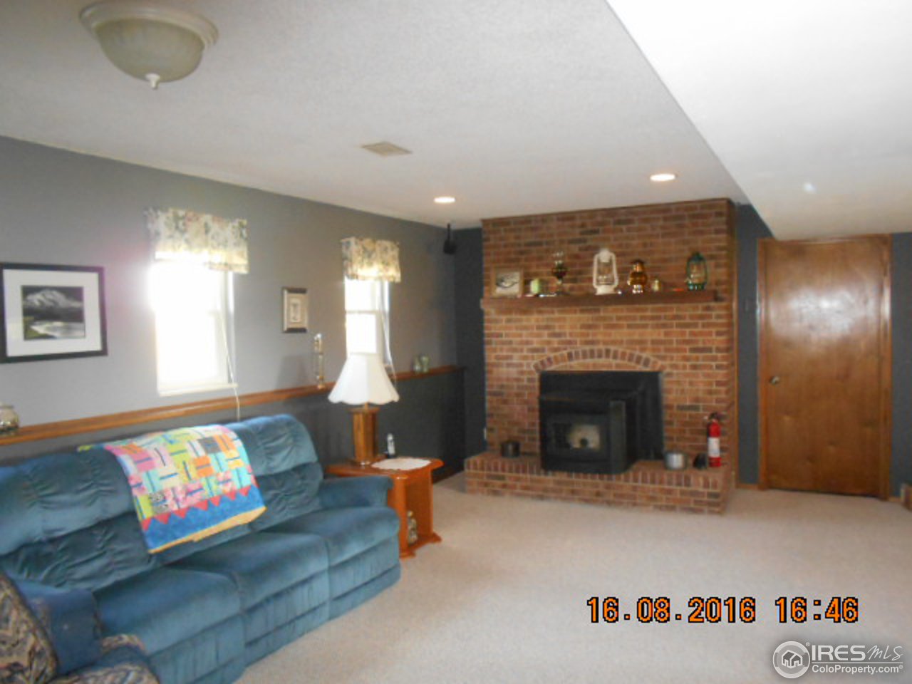 36151 Appy Road Eaton, CO 80615 - Photo 23 of 34 Family room with FP