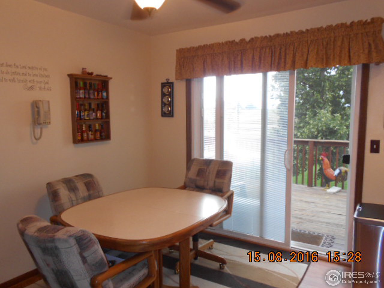 36151 Appy Road Eaton, CO 80615 - Photo 6 of 34 Kitchen Nook to Patio