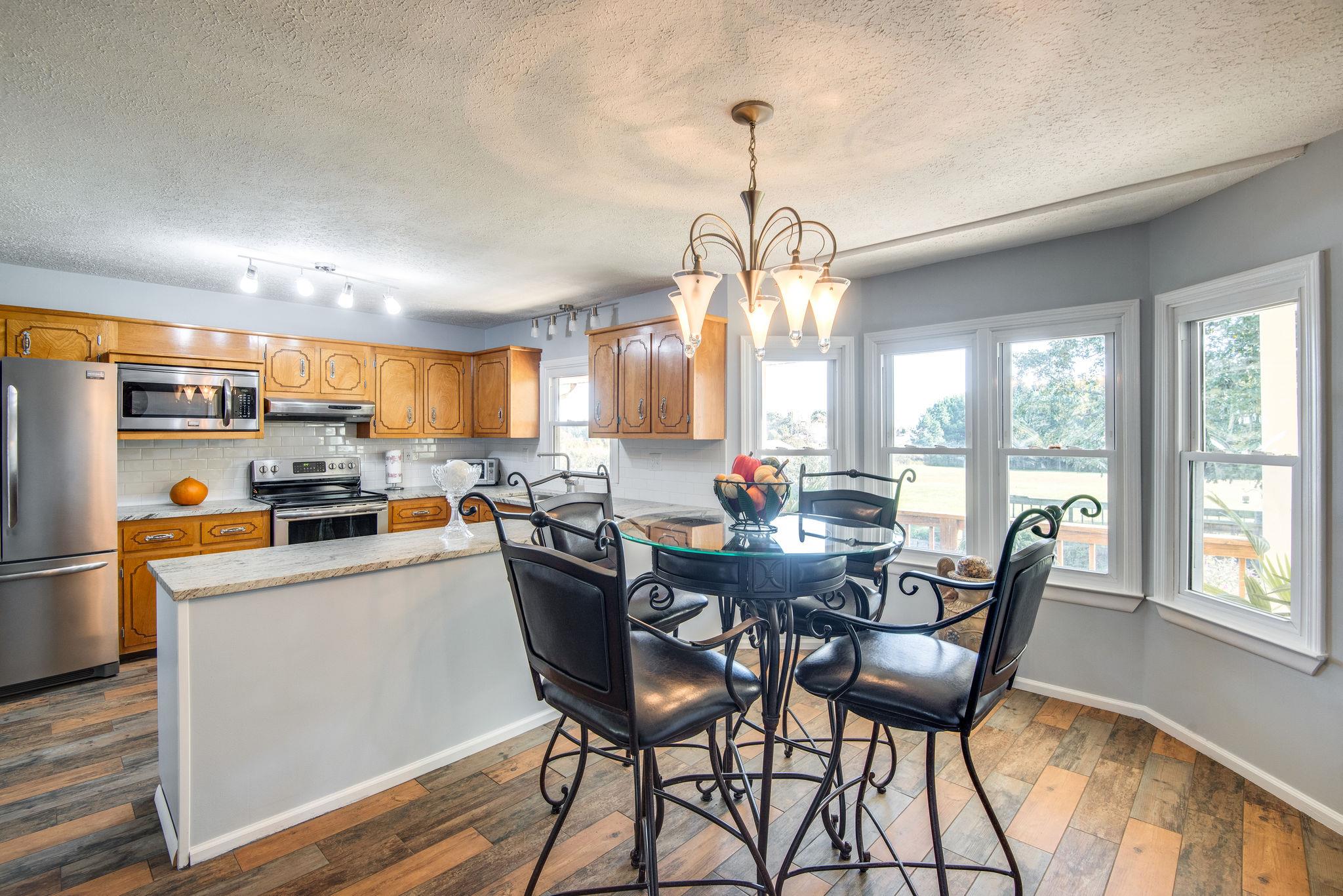 1544 Old Columbia Road Dickson, TN 37055 - Photo 11 of 30 Light and bright eat in area overlooking the beautiful back yard.