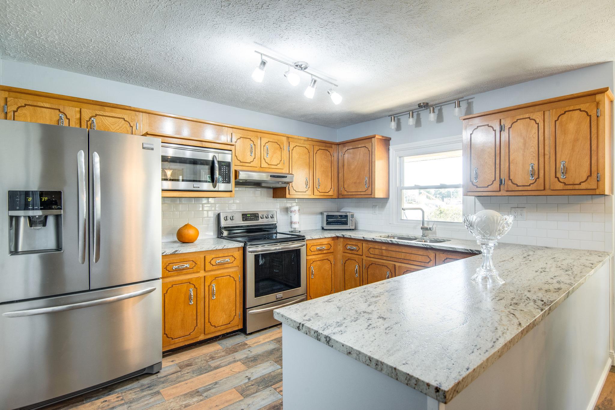 1544 Old Columbia Road Dickson, TN 37055 - Photo 10 of 30 New flooring in kitchen too! Refrigerator can stay.