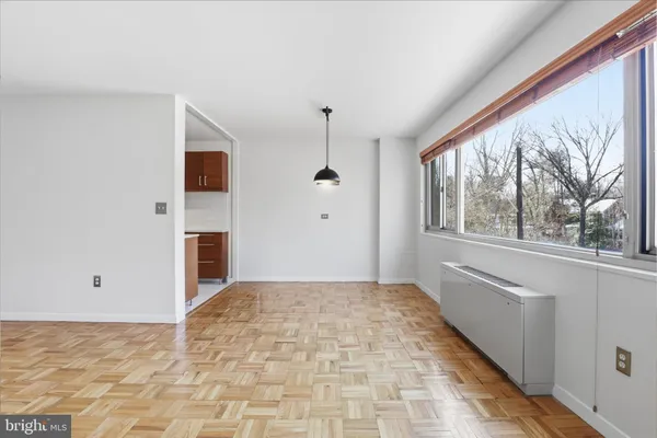 a view of an empty room with a window