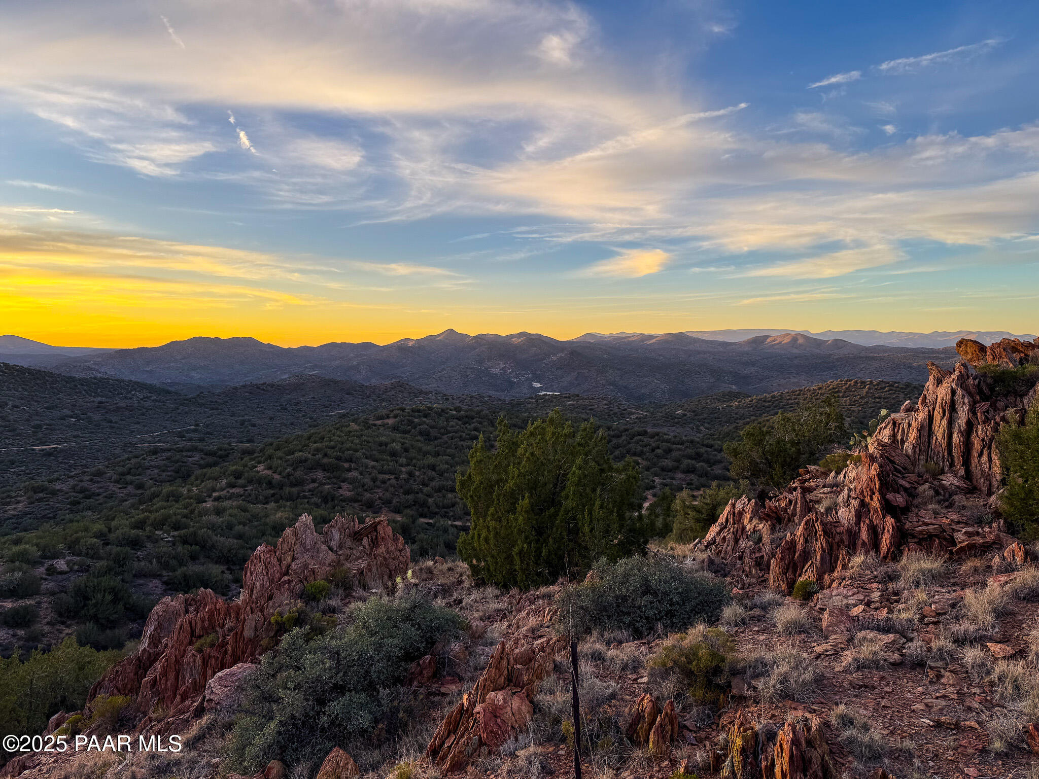 a view of a lake with mountains in the background