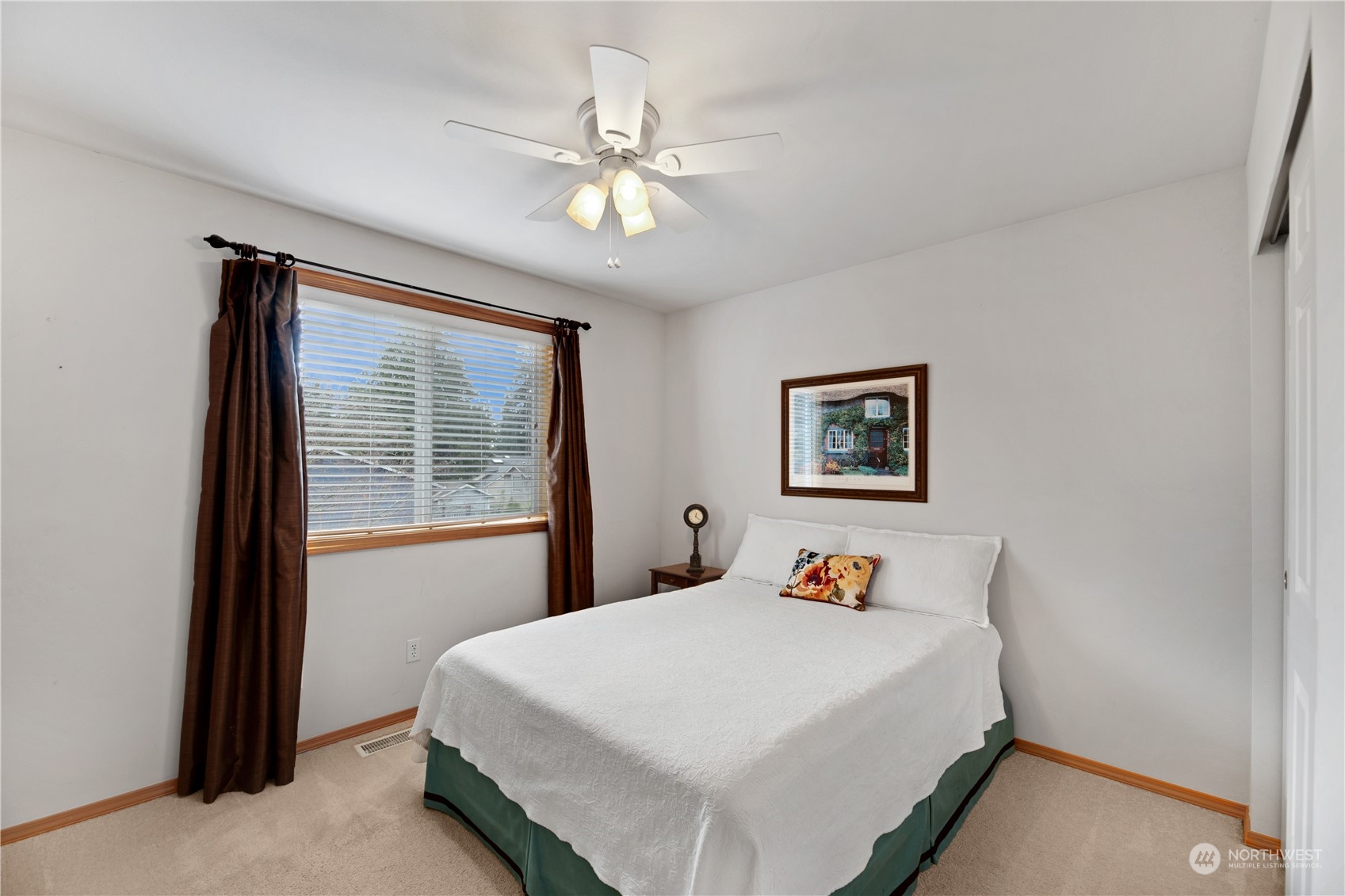 3108 191st Street Southeast Bothell, WA 98012 - Photo 23 of 31 a bedroom with a bed and a window