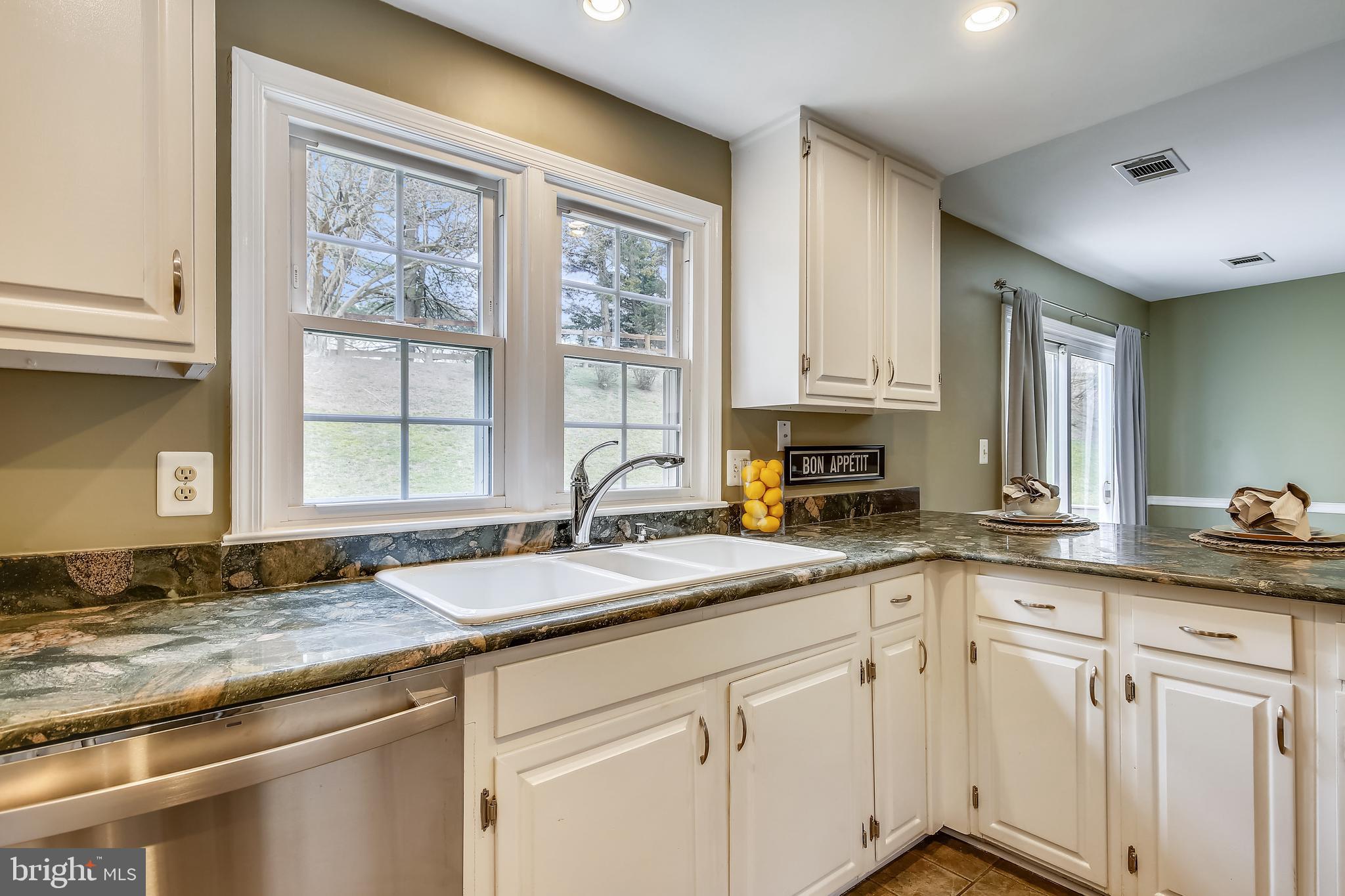 1923 Batten Hollow Road Vienna, VA 22182 - Photo 11 of 37 charming kitchen overlooks the back deck