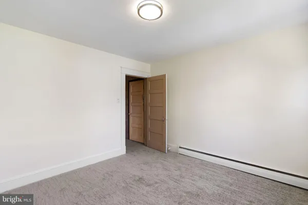 an empty room with an entryway