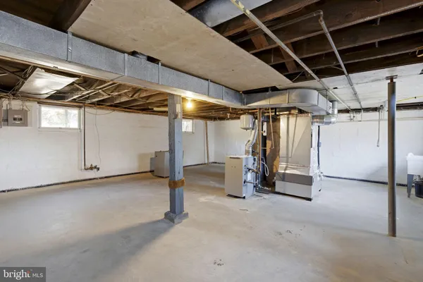 a view of a empty room with wooden walls