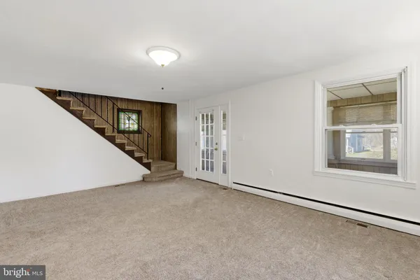 an empty room with windows