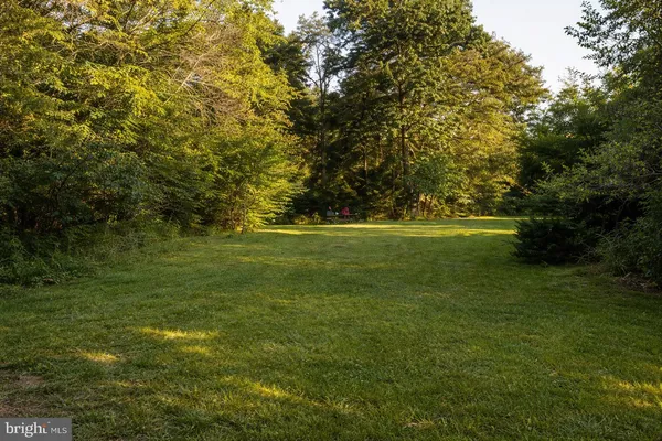 a view of a golf course with green space