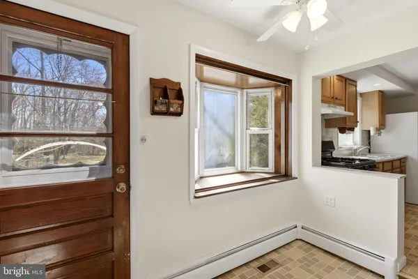 a view of a door and a window in a room