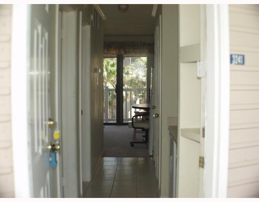 3938 Surfside, Unit 3241 Corpus Christi, TX 78402 - Photo 2 of 8 a view of a bathroom with a glass door