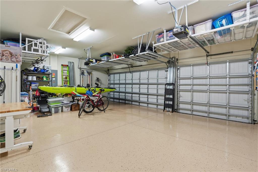 17210 Ashcomb Way Estero, FL 33928 - Photo 32 of 47 a view of a garage with toys
