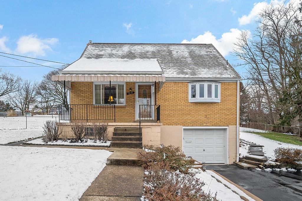 2839 Reiter Road Pittsburgh, PA 15235 - Photo 1 of 25 a front view of a house with a yard