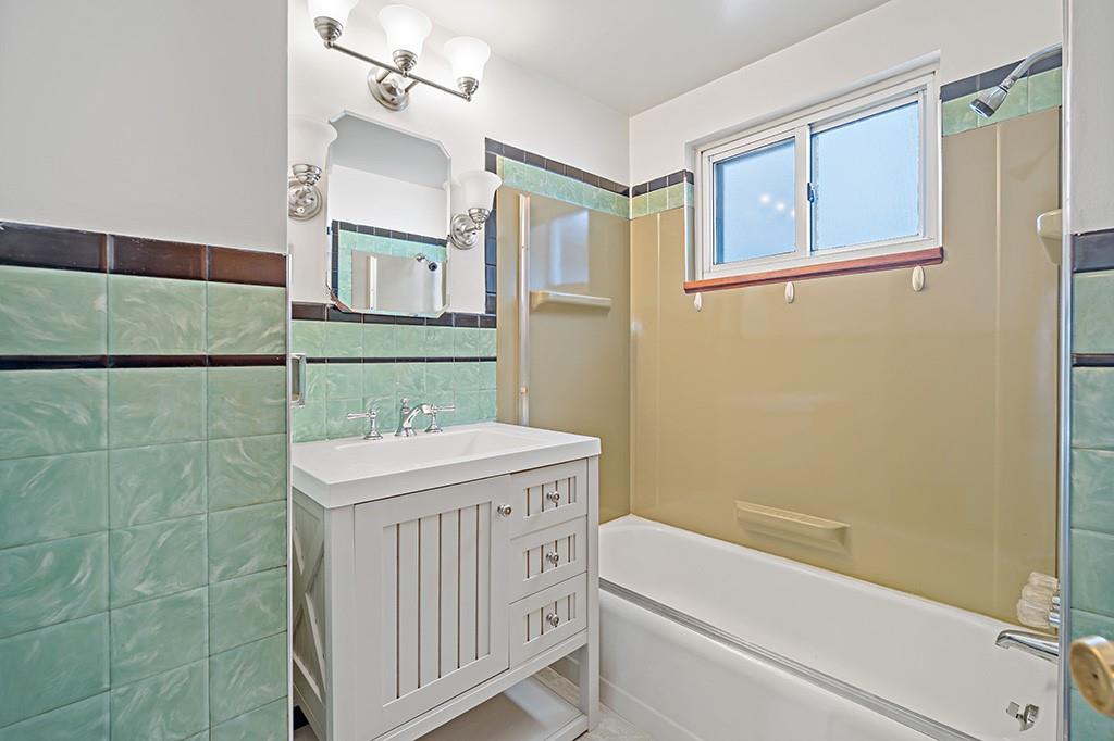 2839 Reiter Road Pittsburgh, PA 15235 - Photo 13 of 25 a bathroom with a granite countertop sink toilet and shower