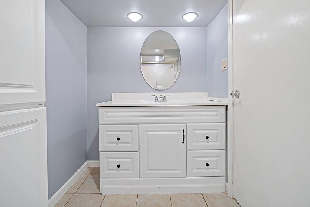 2839 Reiter Road Pittsburgh, PA 15235 - Photo 21 of 25 a bathroom with a mirror and sink