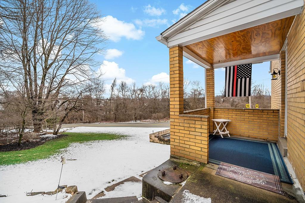2839 Reiter Road Pittsburgh, PA 15235 - Photo 23 of 25 a view of a patio with a table and chairs