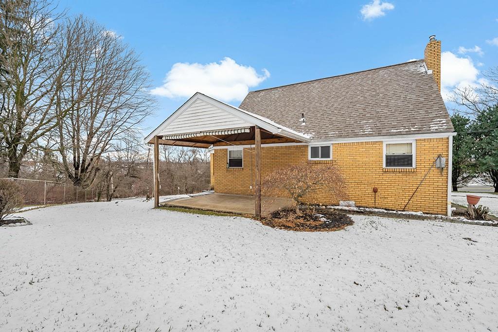 2839 Reiter Road Pittsburgh, PA 15235 - Photo 25 of 25 a view of a house with a snow in the yard
