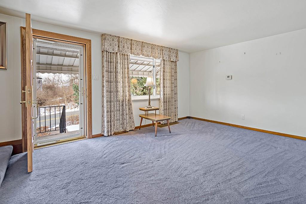2839 Reiter Road Pittsburgh, PA 15235 - Photo 5 of 25 a view of an empty room with glass door