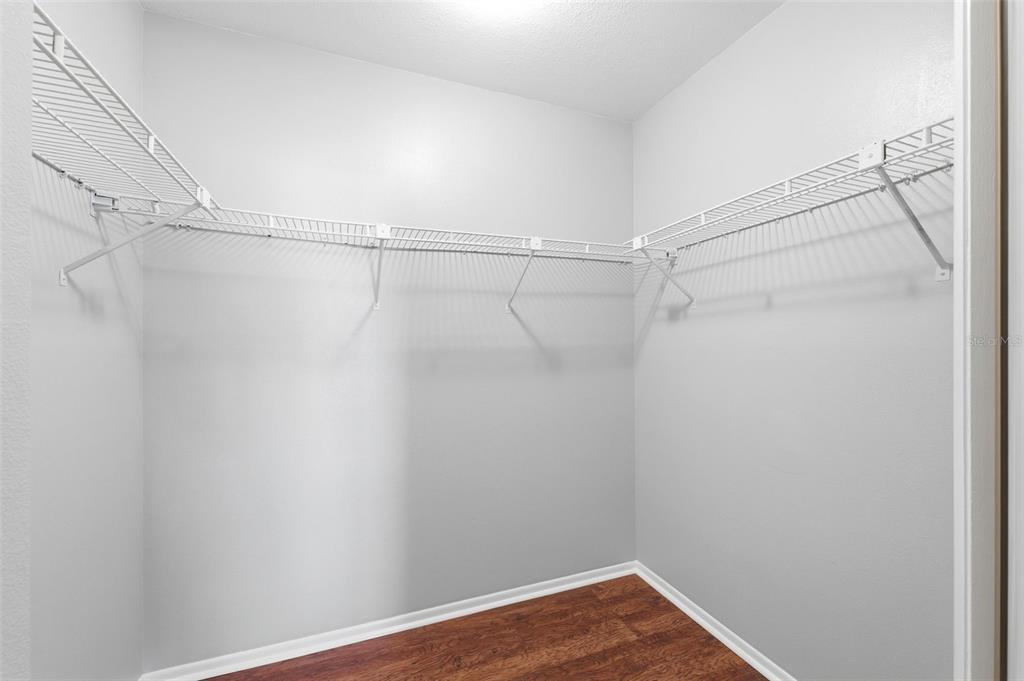 5364 Deltona Boulevard Spring Hill, FL 34606 - Photo 14 of 33 a view of a room with racks on the wall