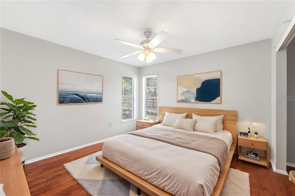 5364 Deltona Boulevard Spring Hill, FL 34606 - Photo 15 of 33 a bedroom with a bed and a window