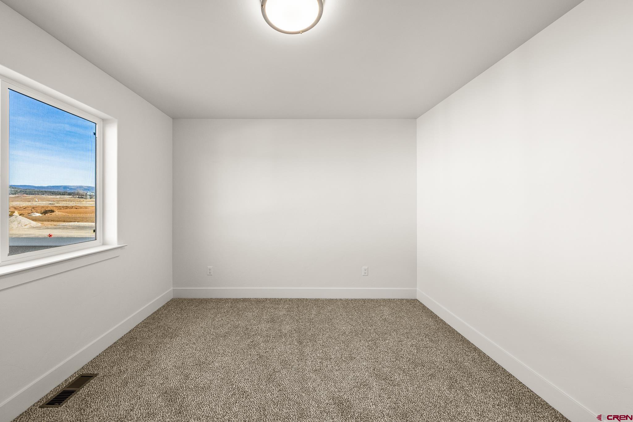 116 Senica Street Bayfield, CO 81122 - Photo 14 of 28 an empty room with a window