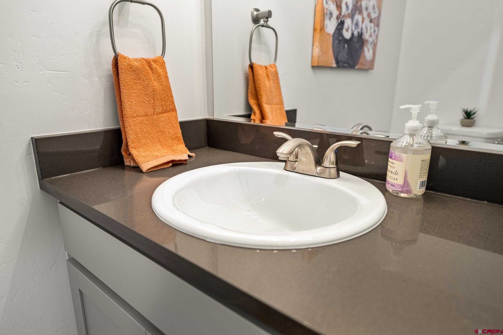 116 Senica Street Bayfield, CO 81122 - Photo 19 of 28 a bathroom with a sink and a mirror