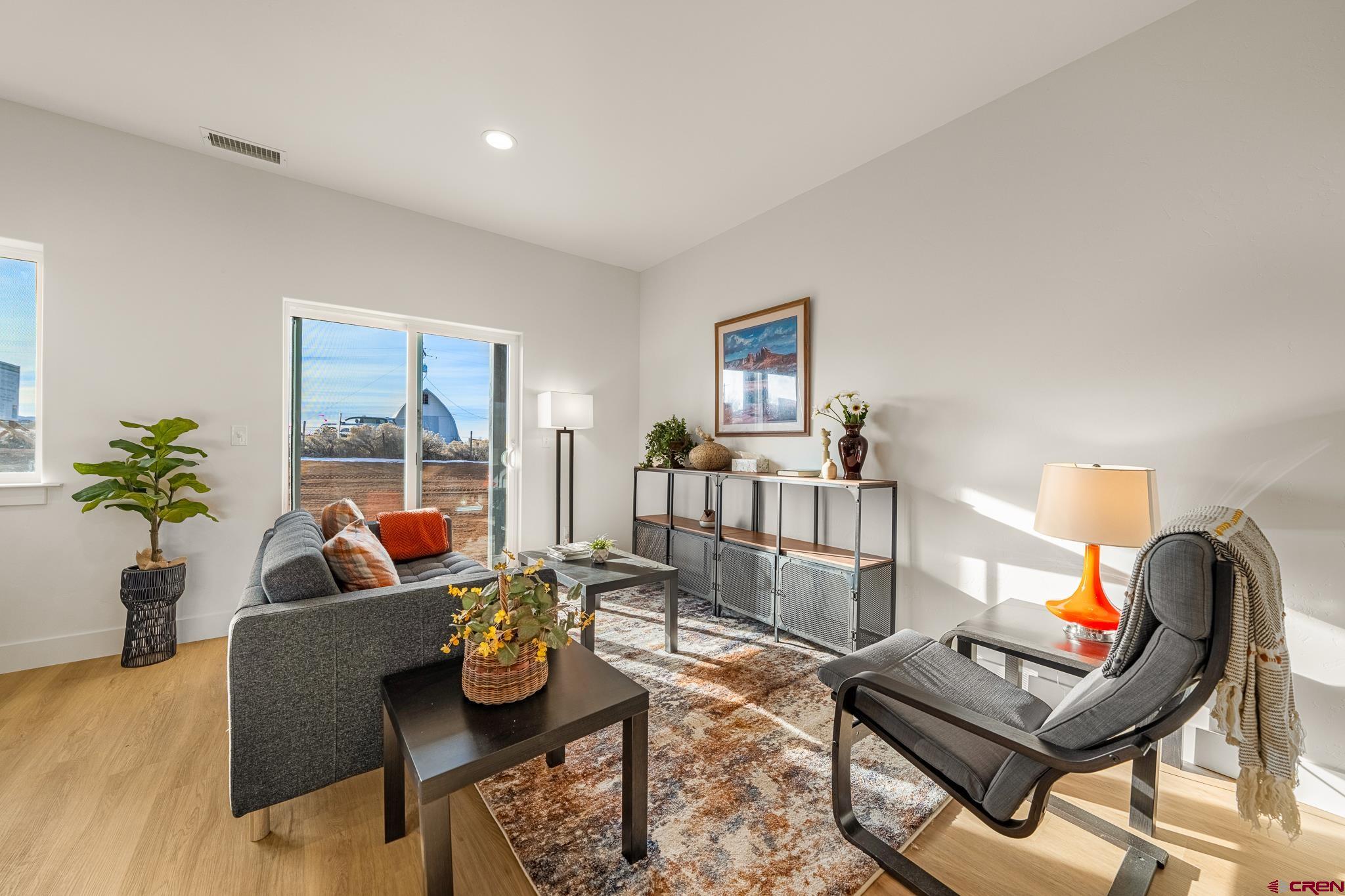 116 Senica Street Bayfield, CO 81122 - Photo 10 of 28 a living room with furniture and a lamp