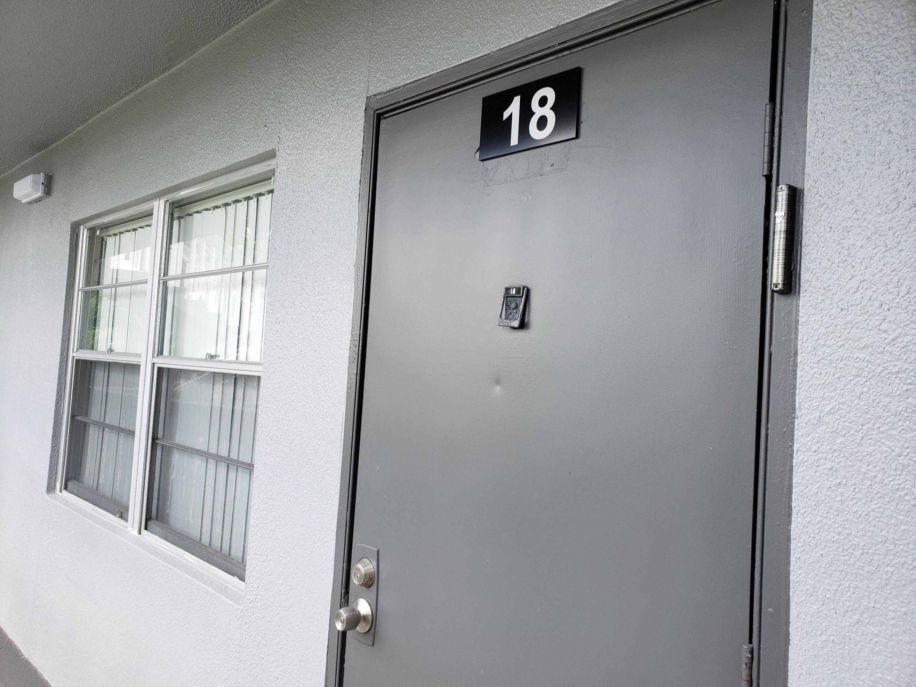 18 Suffolk A Boca Raton, FL 33434 - Photo 16 of 28 front door