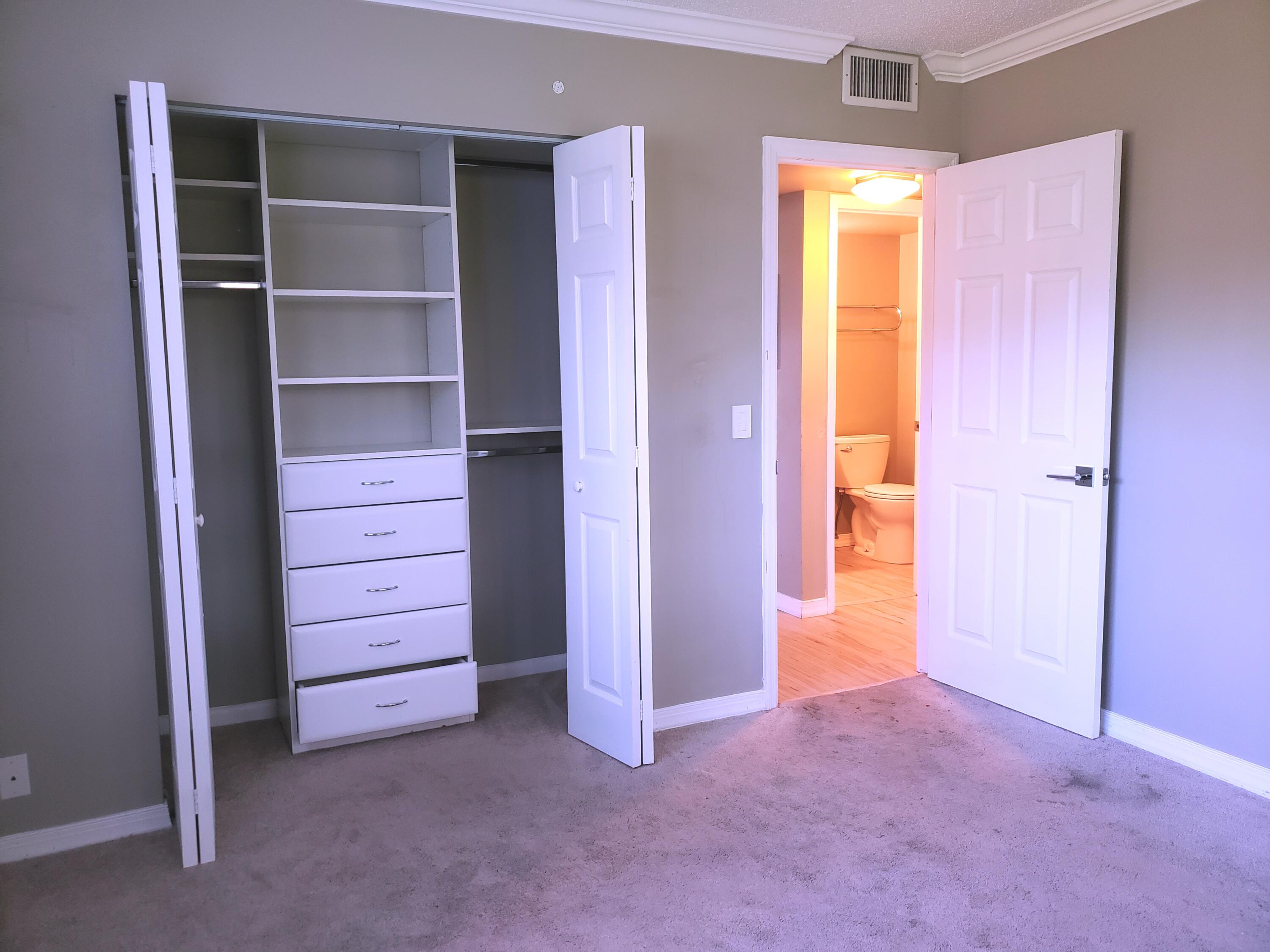 18 Suffolk A Boca Raton, FL 33434 - Photo 8 of 28 custom closet - primary bdrm