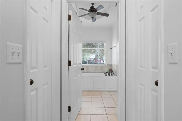 a bathroom with a bathtub and shower