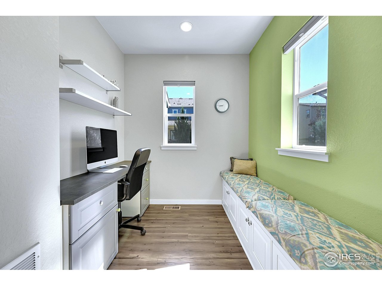 68 Starlight Circle Erie, CO 80516 - Photo 17 of 50 a workspace with furniture and window