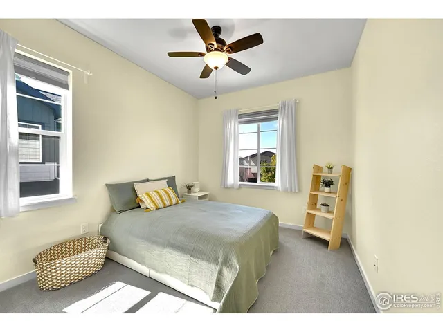 a bathroom with a double vanity sink and mirror