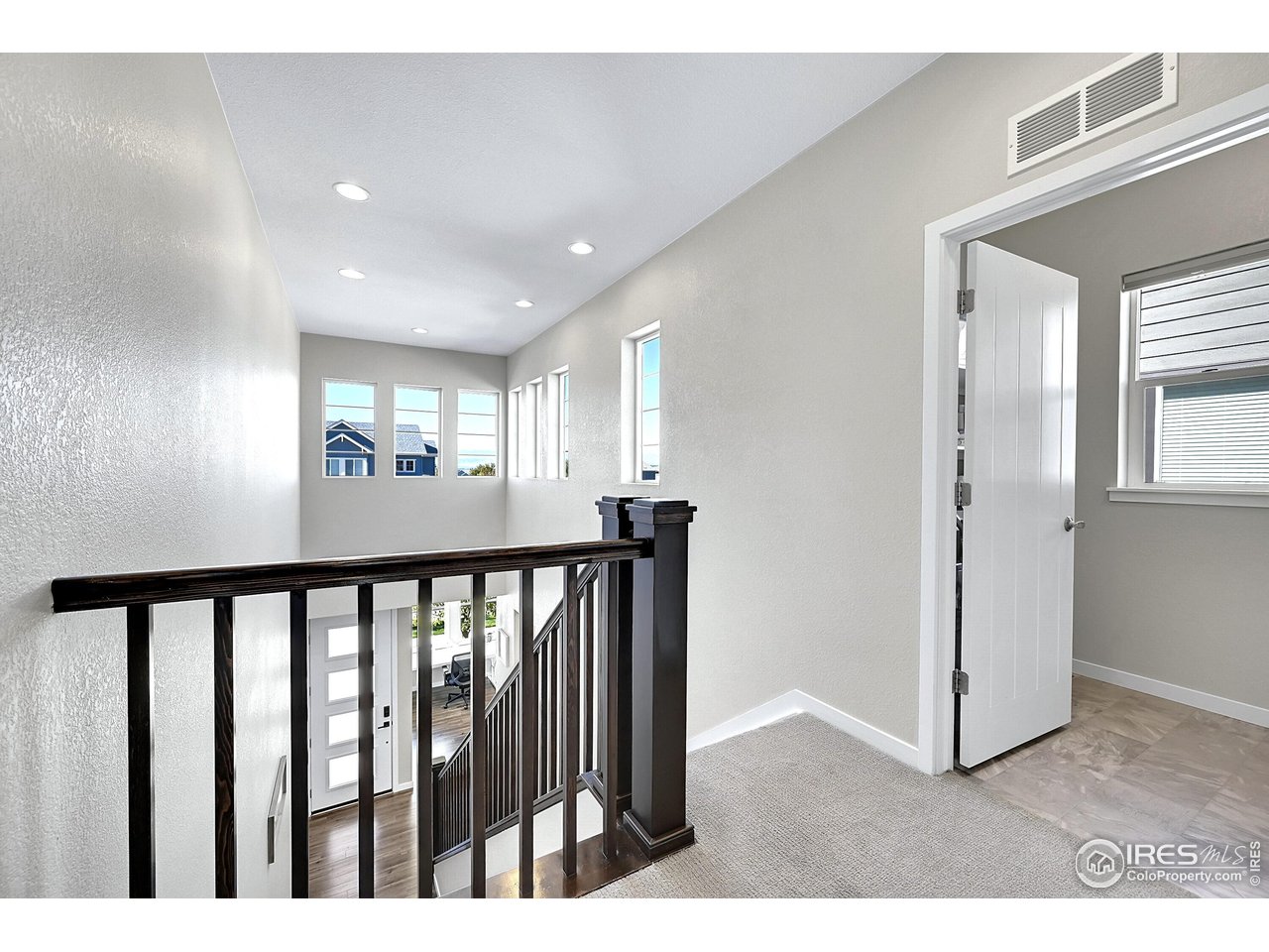 68 Starlight Circle Erie, CO 80516 - Photo 32 of 50 a view interior of a house with wooden floor