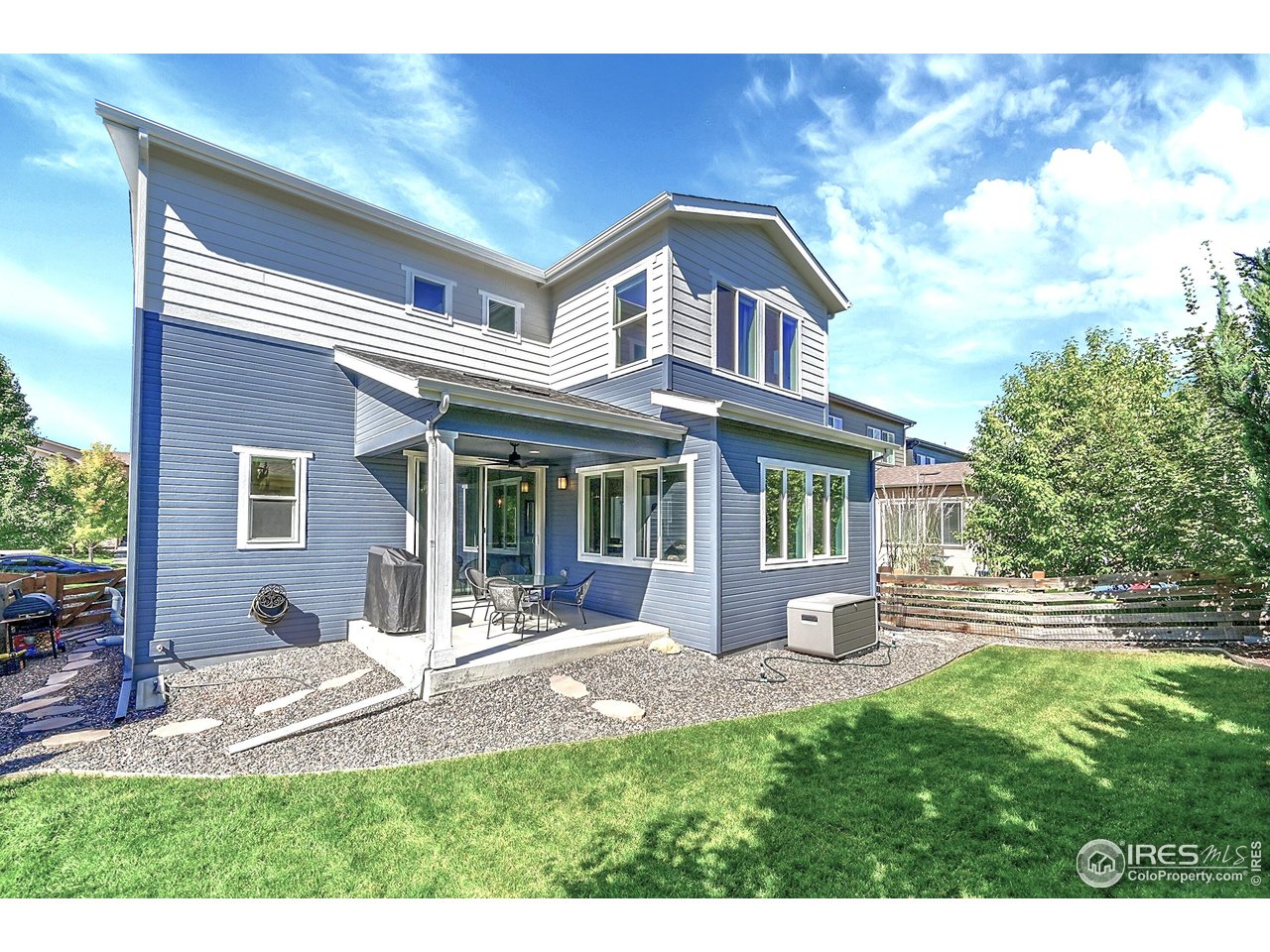 68 Starlight Circle Erie, CO 80516 - Photo 34 of 50 a front view of a house with a yard