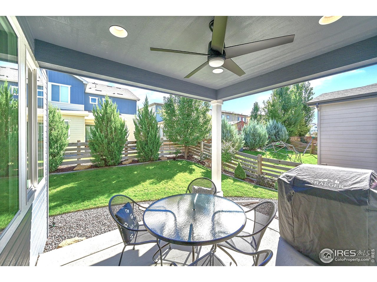 68 Starlight Circle Erie, CO 80516 - Photo 35 of 50 a view of a porch with furniture and yard