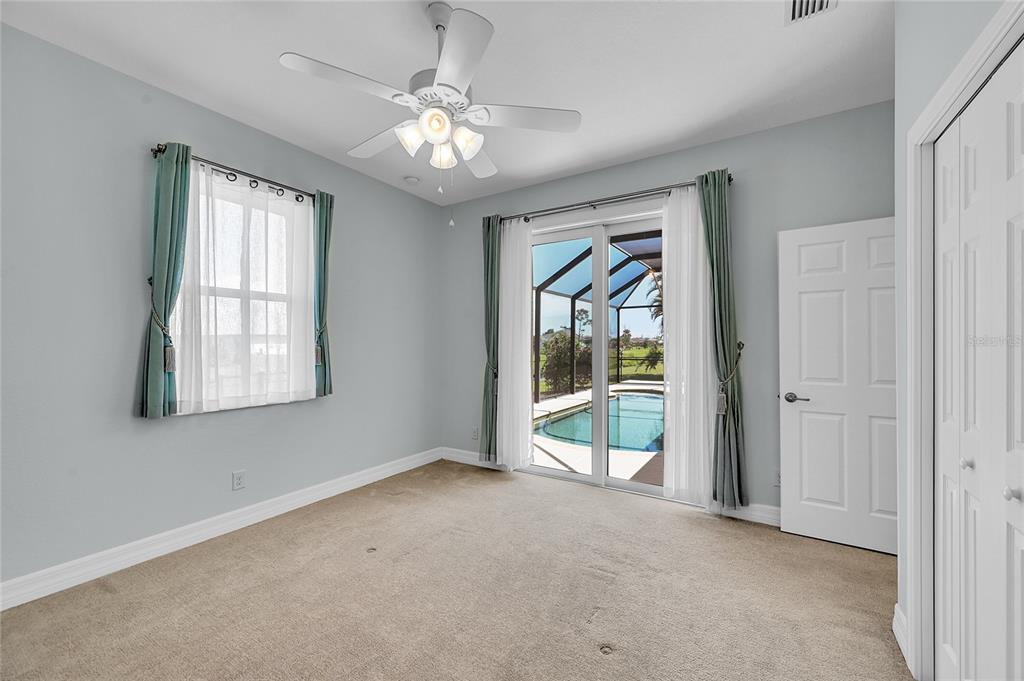 233 Fairway Road Rotonda West, FL 33947 - Photo 24 of 63 a view of an empty room with a window