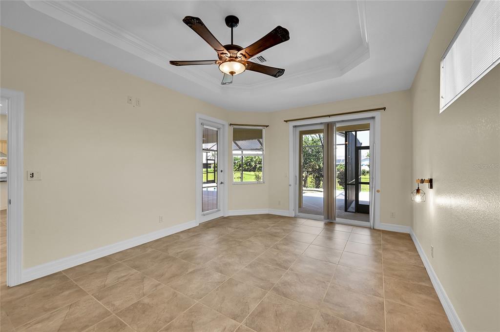233 Fairway Road Rotonda West, FL 33947 - Photo 29 of 63 a view of an empty room with a window